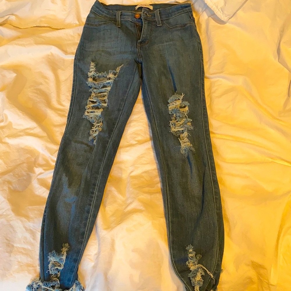 Vibrant women’s high rise denim ripped jeggings